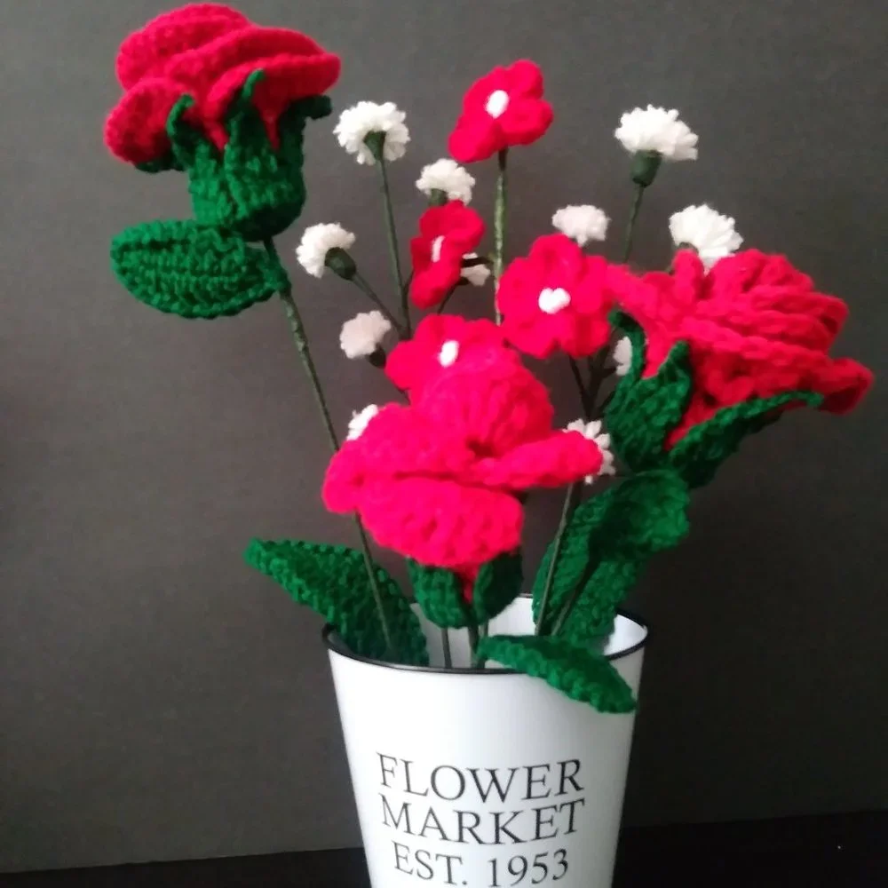 Handmade crochet bouquet of red roses,